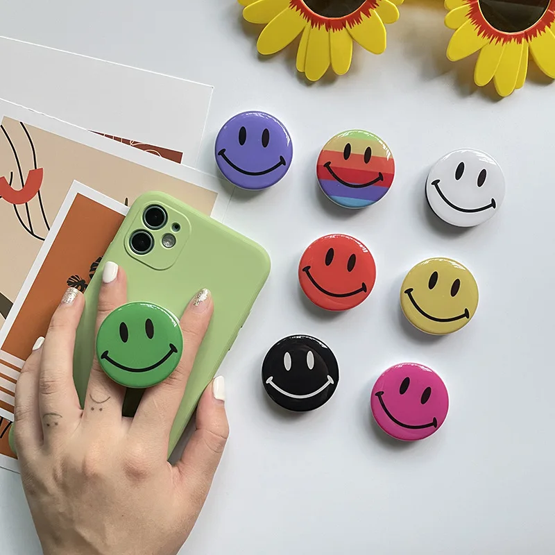 

Cartoon smiley face airbag retractable desktop mobile phone bracket creative portability