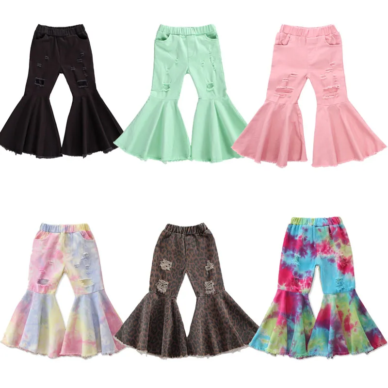 Детские розовые расклешенные брюки для девочек детские однотонные рваные с