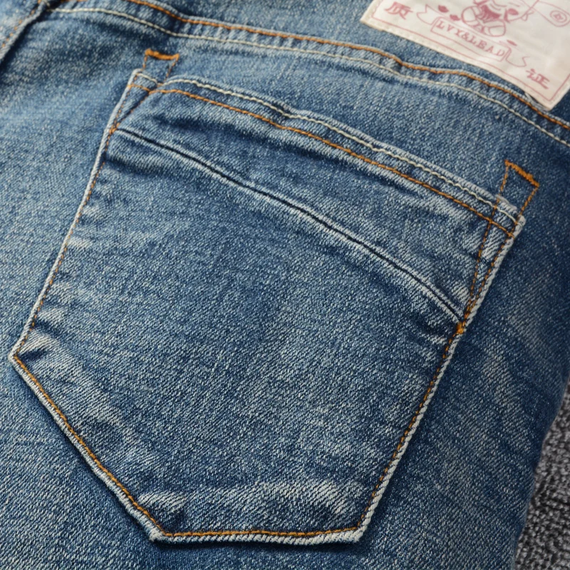 

Newly Designer Fashion Men Jeans Retro Blue Elastic Slim Fit Casual Denim Trousers High Quality Vintage Patch Cotton Long Pants