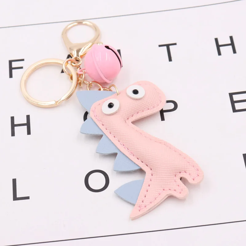 

2021 Creative Big Eye Dinosaur Keyring Pu Leather Bag Pendant Personalized Leather Bell Car Keychain Pendant Gift Keychains
