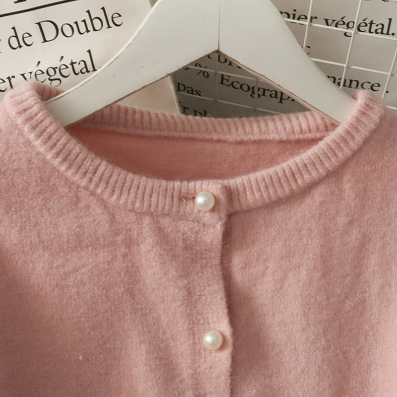 

Coson 2021 New Spring Women Cardigan Jacket Pearl Single Breasted O Neck Knitted Cardigan Korean Loose Solid Knitwear Sweater