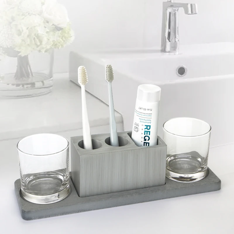 Ванная комната в ванной принимает три набора цементных маятниковых частей