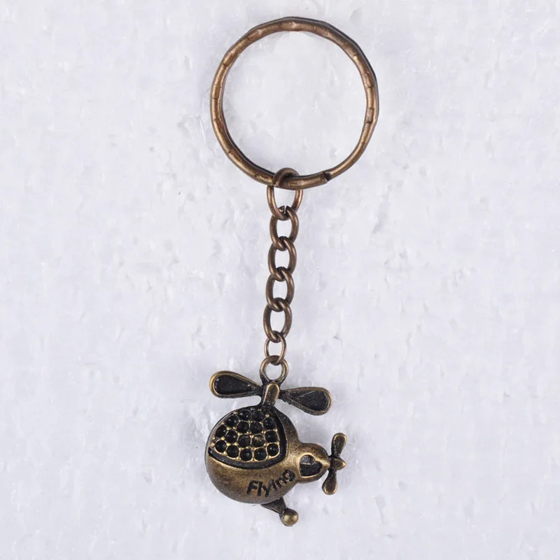 Винтажный брелок для ключей в виде летающего вертолета из античной бронзы 22*25 мм