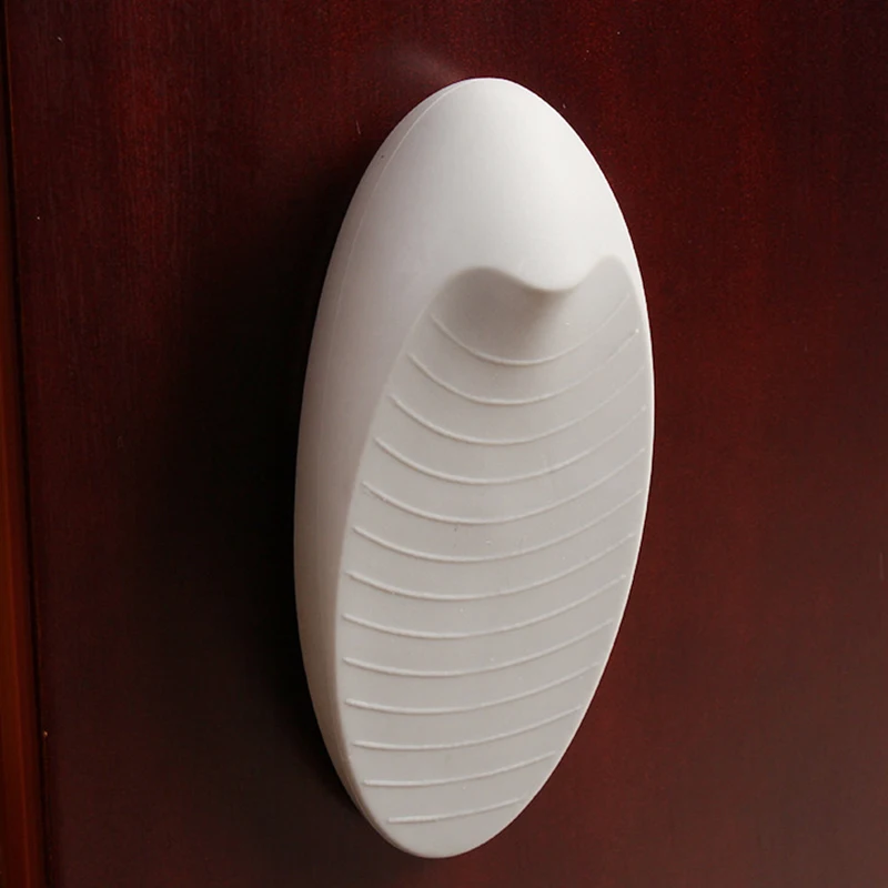 

Door Stopper Wedge Soft Non-Scratching Heavy Duty Door Bar Handle Holder Hollow Hangable Storage with Adhesive for Wall BOM666