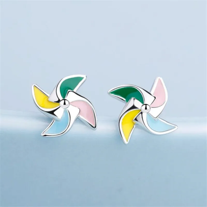 

Новинка, простая и компактная цветная мельница, креативные серьги-гвоздики из стерлингового серебра 925 пробы с покрытием, темпераментные ка...