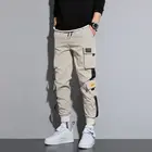 Брюки-карго мужские с несколькими спортивные брюки с карманами, уличная одежда в стиле хип-хоп, брюки для бега в стиле оверсайз, черный цвет, 5XL