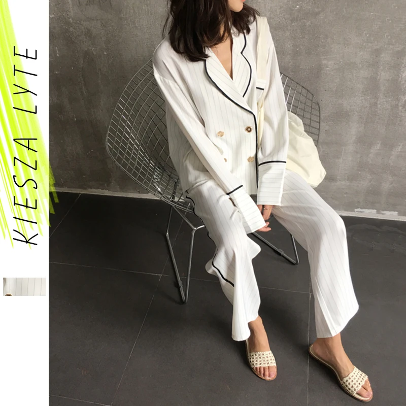 Модный женский брючный костюм в полоску комплект из двух предметов с курткой для