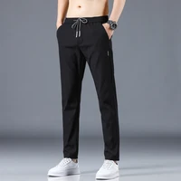 new ice silk trousers loose straight casual mens trousers thin quick drying micro elastic nine point trousers in summer