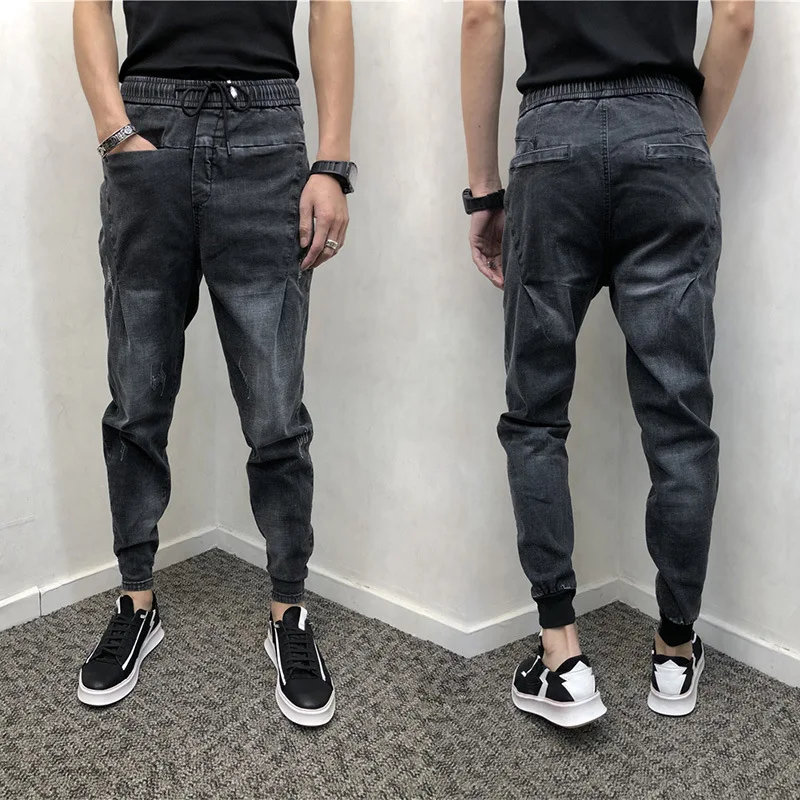 

Autumn trend jeans super fire pants men's net red with the same paragraph Slim feet Korean black teenagers pencil trousers