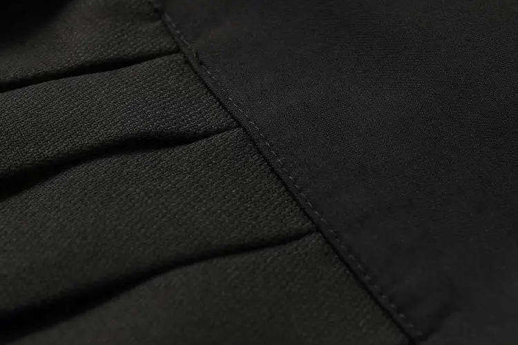 

Black single breasted pleated skirt for women