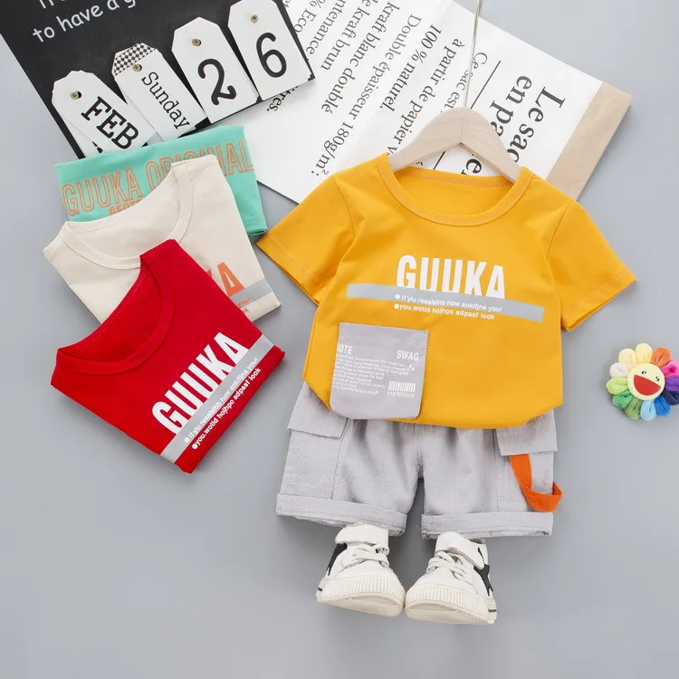 

Новинка 2021, летний комплект одежды для маленьких мальчиков, футболка с надписью и карманами + шорты для маленьких девочек, повседневная детс...