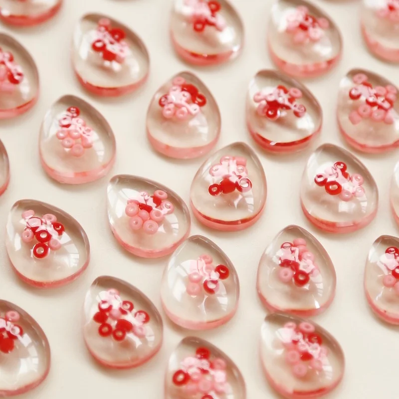 

The circle is mixed with water droplets and a half pill DIY earrings resin accessories homemade jewelry materials