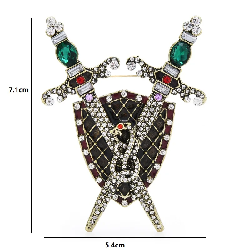 Брошь со стразами в виде мечей и щита |