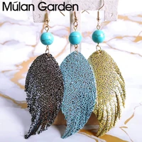 mg glitter cowhide leather earrings for women pendant wing tasstel earrings fashion jewelry accessories hot sale gift