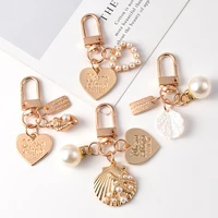 lovely pearl shell key chain pendant ins metal jewelry lady handbag car key chain pendant children gift toys