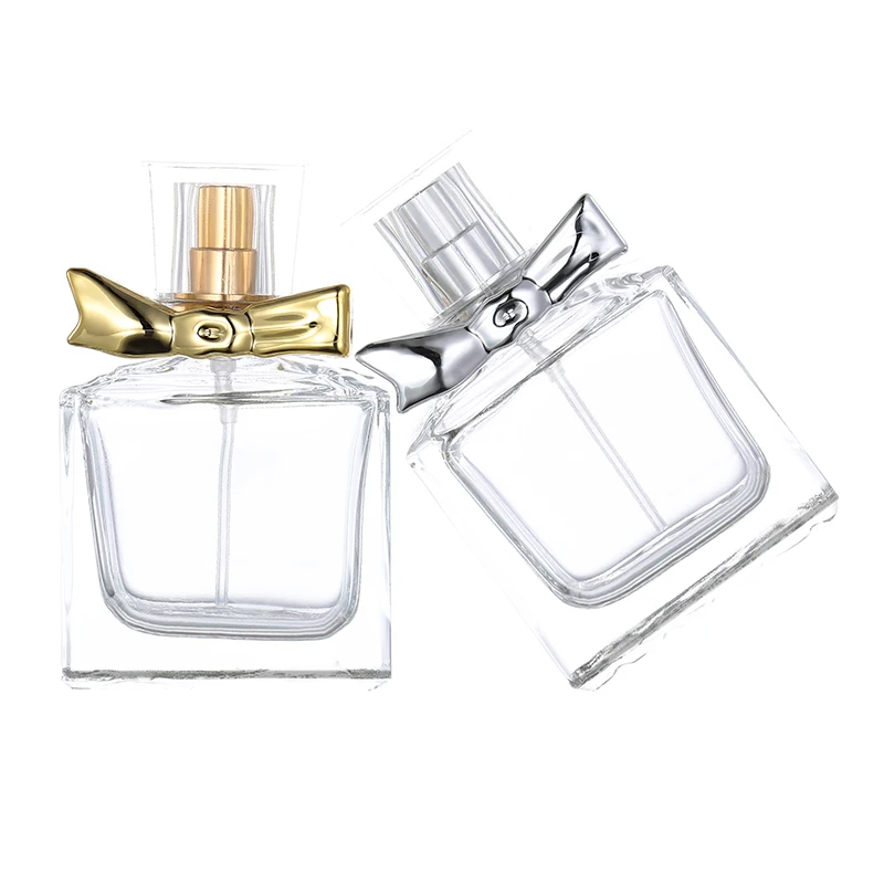 

50pcs portable sub bottle, exquisite butterfly cap, 30ml transparent glass perfume bottle, pressed spray bottle