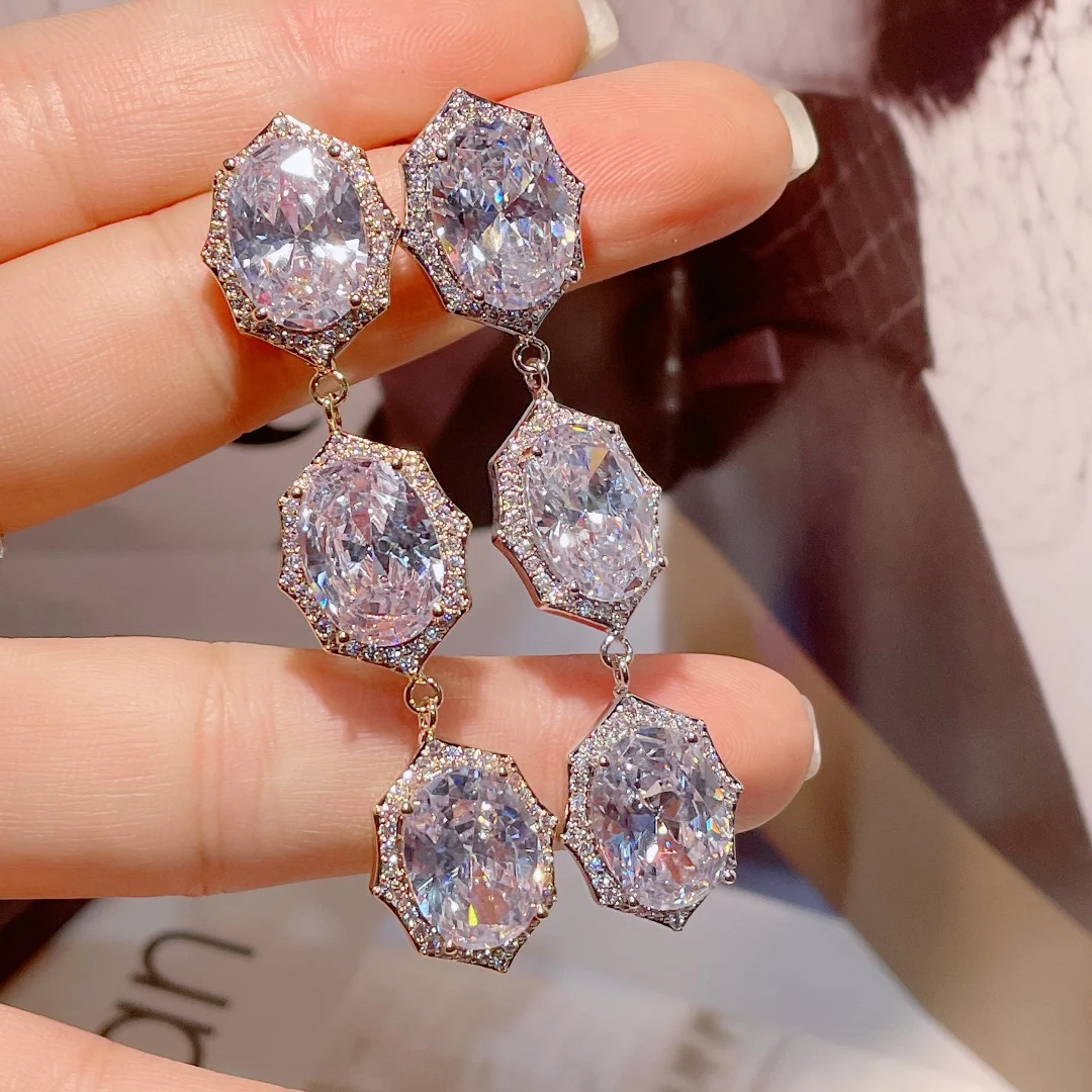

HIBRIDE Shiny Dangle Drop White Color AAA Cubic Zirconia Crystal Long Drop Earrings for Women Party Jewelry bijoux femme E-1044