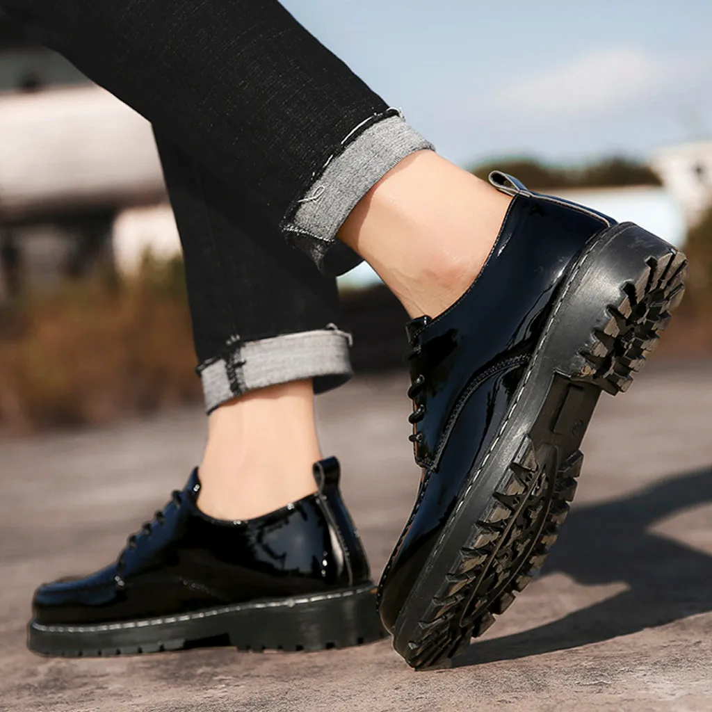 

2020 new casual men's solid color flat bottom with breathable round head anti-skid straps comfortable business shoes