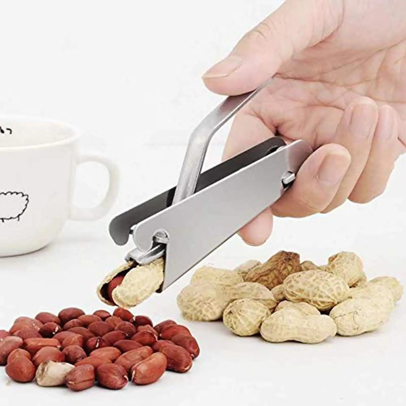 

Stainless Steel Nutshell Peeler Pine Nut Sheller Folder Kitchen Cracker Tool