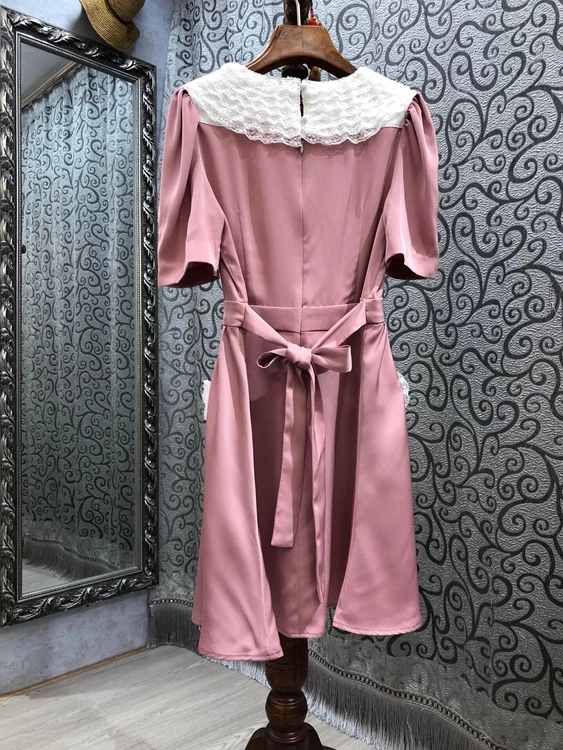 

2021 spring new women's fashion lace color matching stitching neckline symmetrical pocket bow dress 304