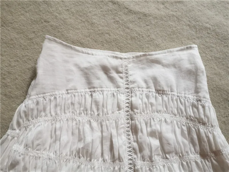 

2021 Summer New Women Short Skirt White Asymmetric Linen Lady Skirt High Waist Ruffled HEM Embroidered Fashion MINI SKIRTS