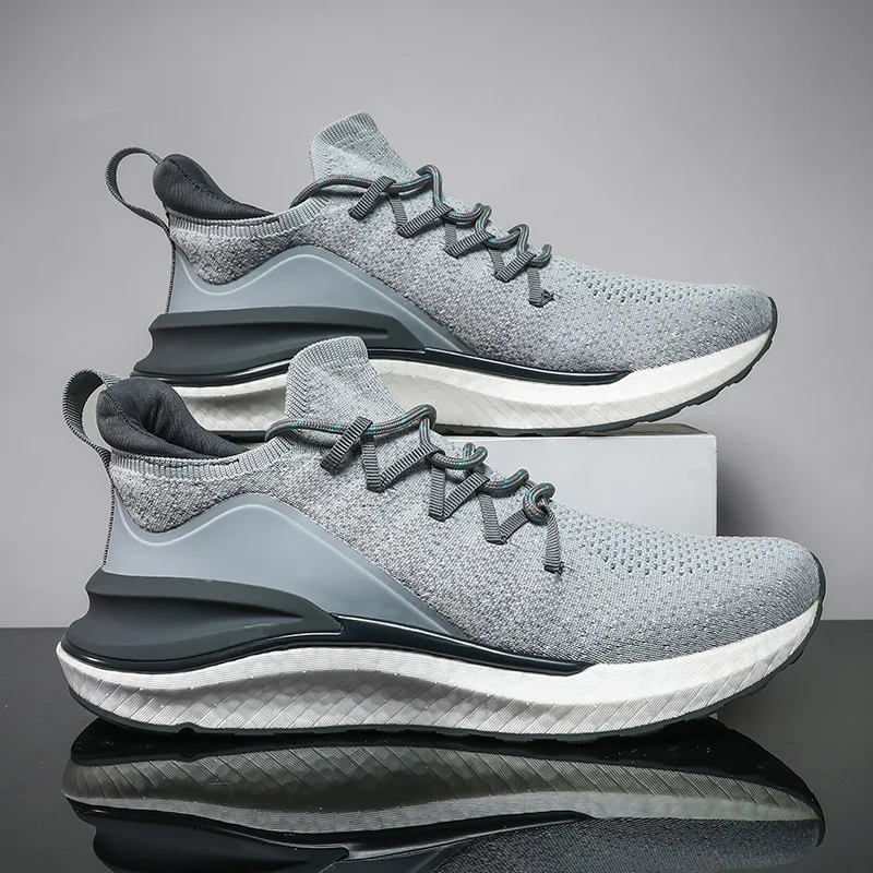 

Hongxing Erke men's co branded 2021 summer new mesh leather stitched running shoes casual wear-resistant sneakers