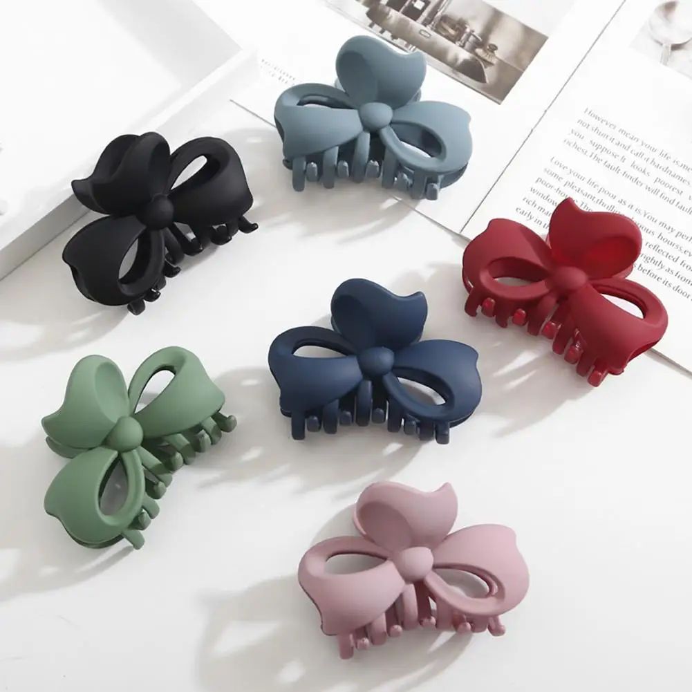 Заколка-зажим для волос в виде банта карамельного цвета |