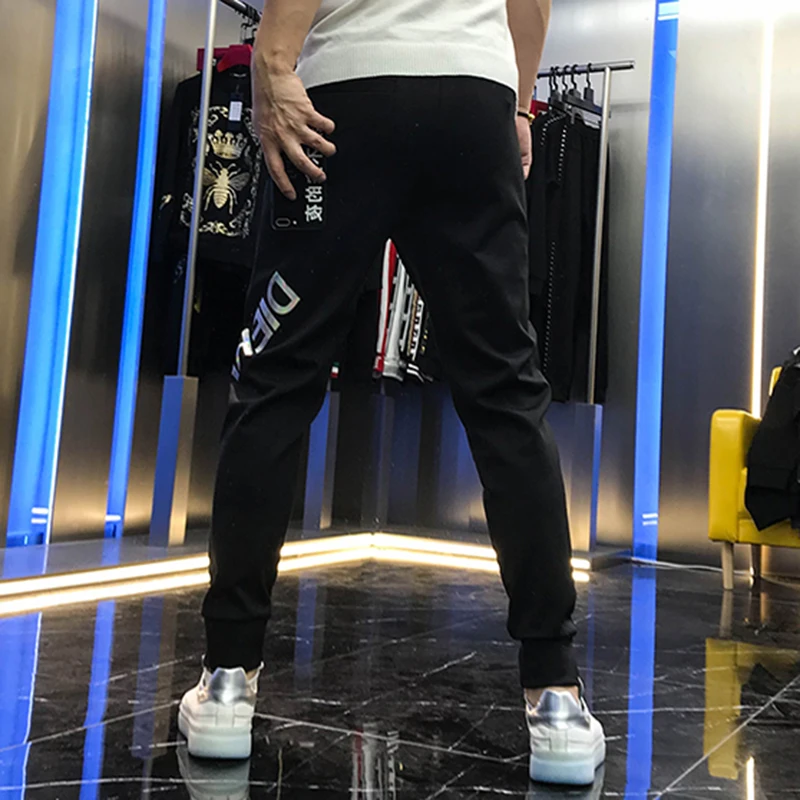 European station autumn 2020 handsome badge embroidered letters color printing fashion brand Leggings slim casual pants for men | Мужская