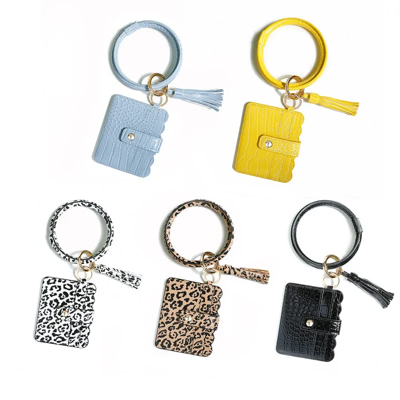 

Sports Portable Mini Bag Bracelet Key Chain Leather Tassel Pu Card Case Bracelet Key Ring Purse Case Bag Organizer
