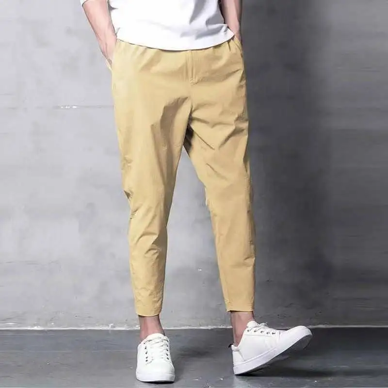 

Summer 9-point casual pants men's Korean fashion versatile slim legged men's 2021 new 9-point pants