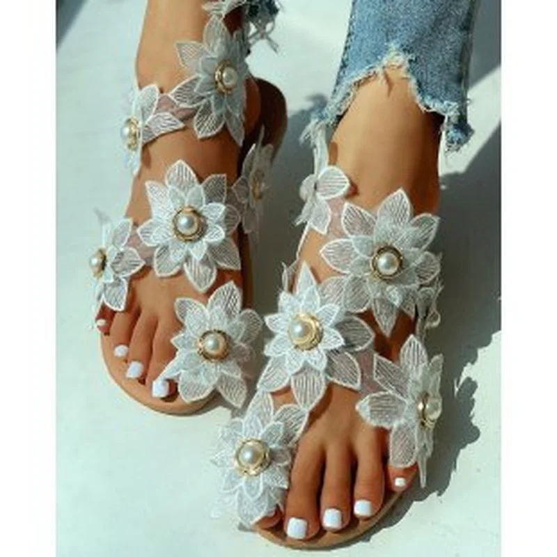 

Босоножки женские летние новые модные женские сандалии 2021 обувь на плоской подошве римские сандалии на шнуровке в цветочном стиле сандалии...