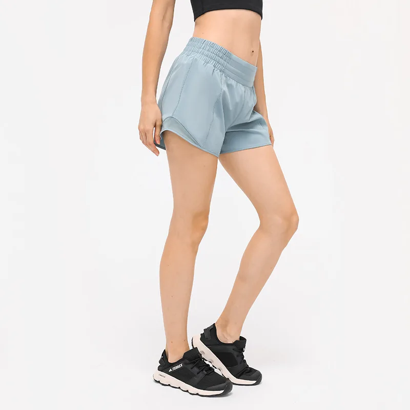 

2021 Spring And Summer New Elastic Waist Mesh Yoga Loose Breathable Hidden Zipper Pocket Sports Shorts Women