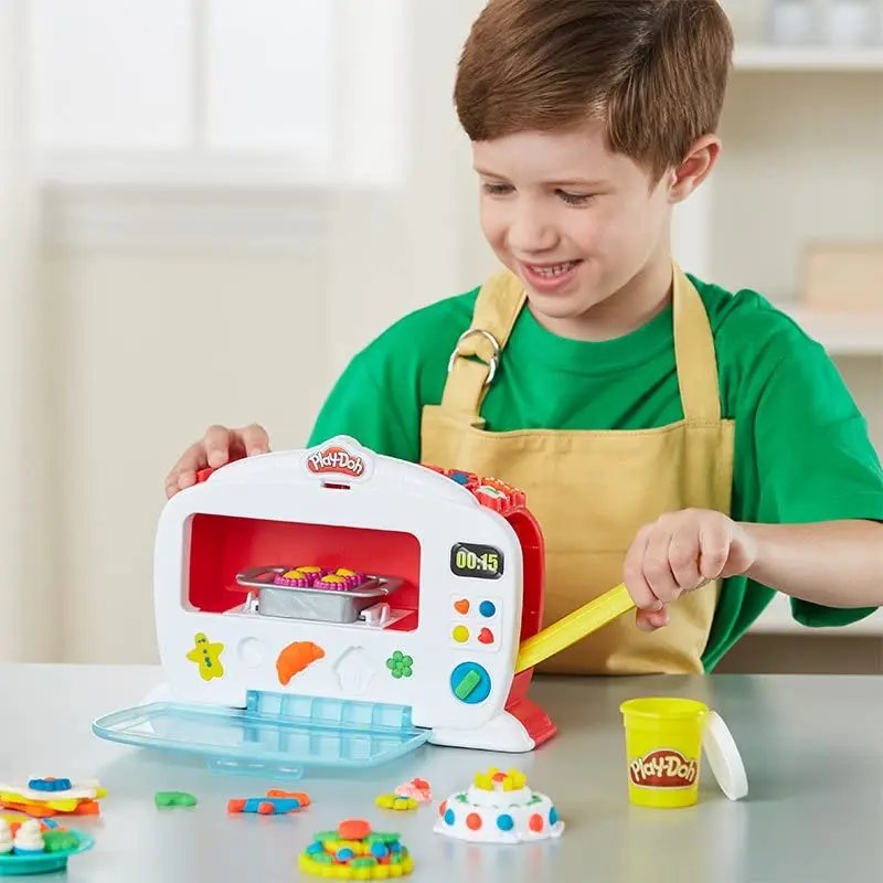 

PlayDoh Kitchen Creations Magical Oven with 6 Cans of Play Doh Brand Modeling Compound and Model Tool Plasticine DIY Toy B9740