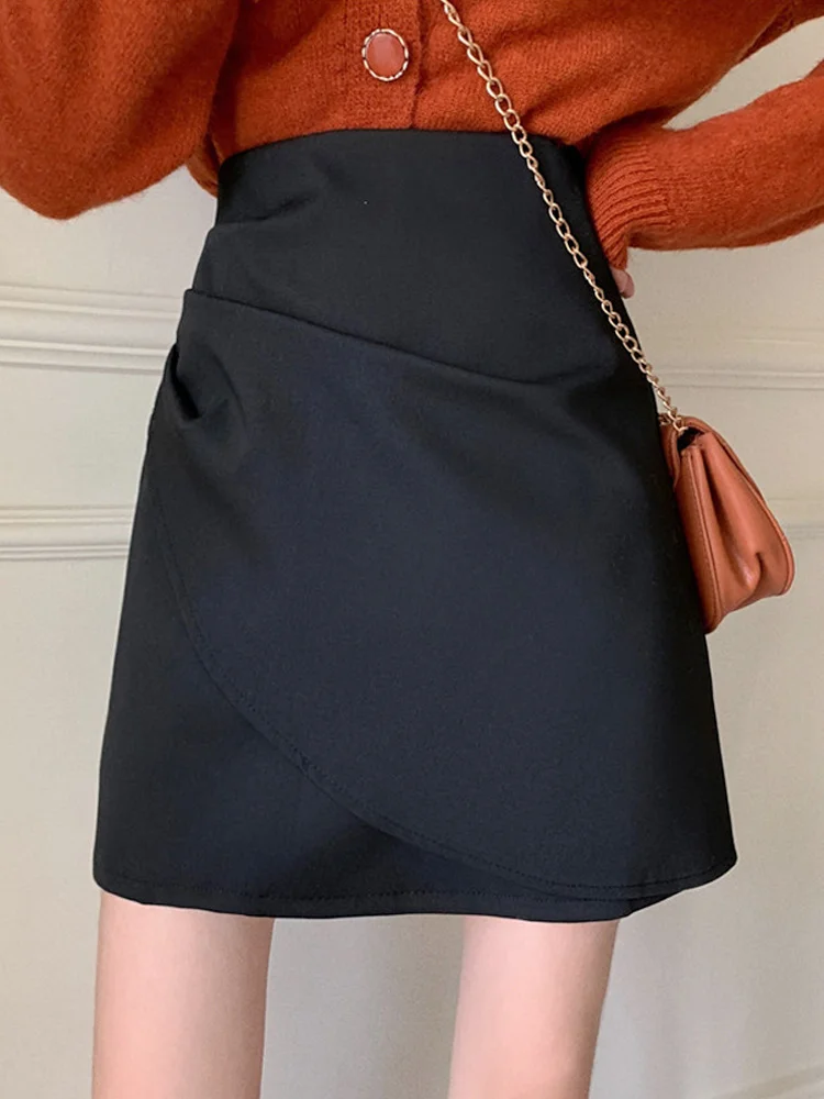 

Черная Женская юбка на весну и осень, тонкая трапециевидная юбка с высокой талией, новый дизайн 2021, популярная короткая юбка с запахом на бед...