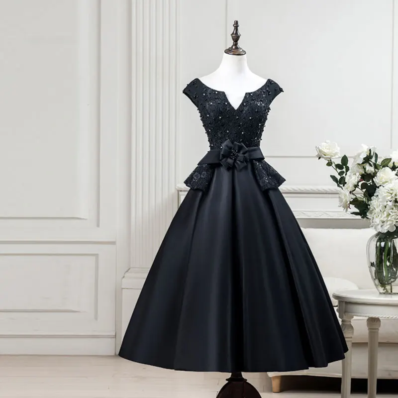 Черное вечернее платье Tanpell с V образным вырезом рукавами крылышками шнуровкой