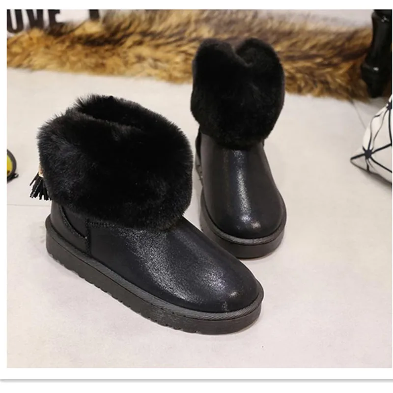

2021 winter new waterproof and ski boots women's short boots student short tube fringed wool round head warm cotton shoes