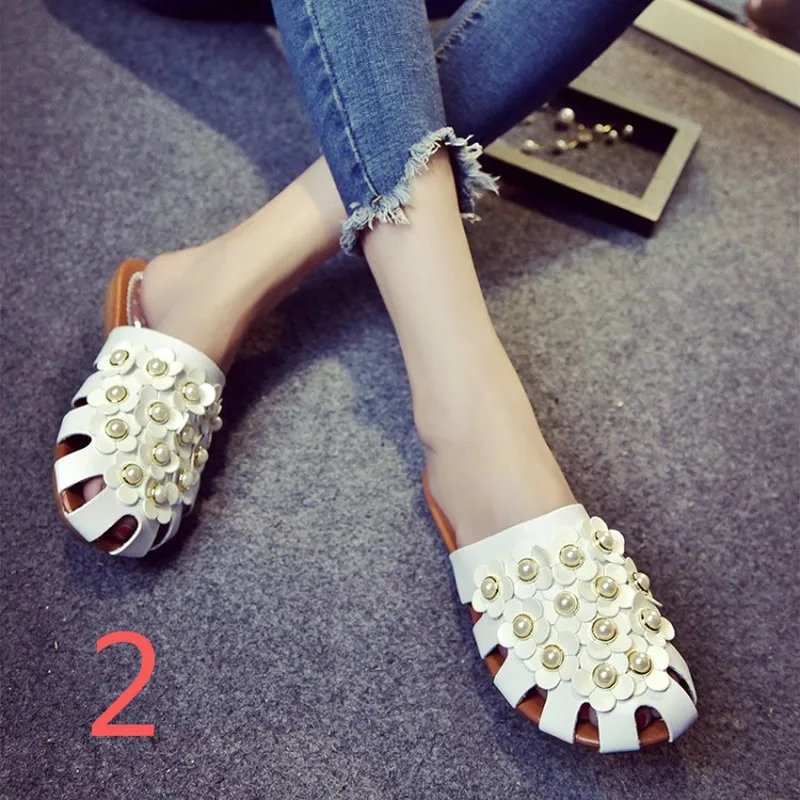WUYAZQI Summer new  fashion pearl hollow flower  flat bottom sandals and slippers female Baotou  tide wholesale women's shoes