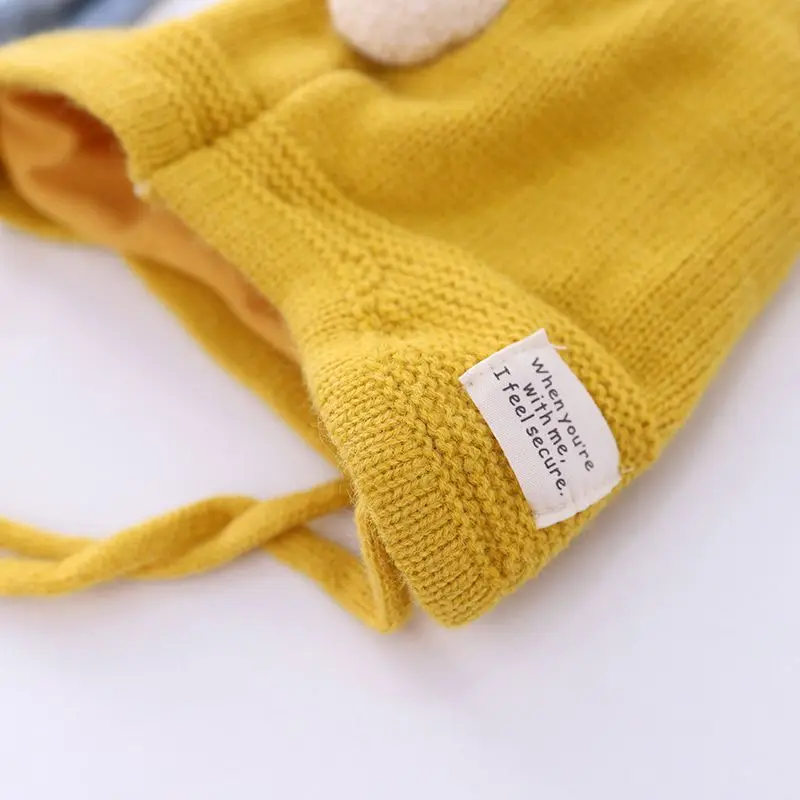 

Winter Chirldren Polka Dot Knitted Warm Hat Super Cute Cartoon Style Hat Baby Lace-up Ear Protection Hat HOT