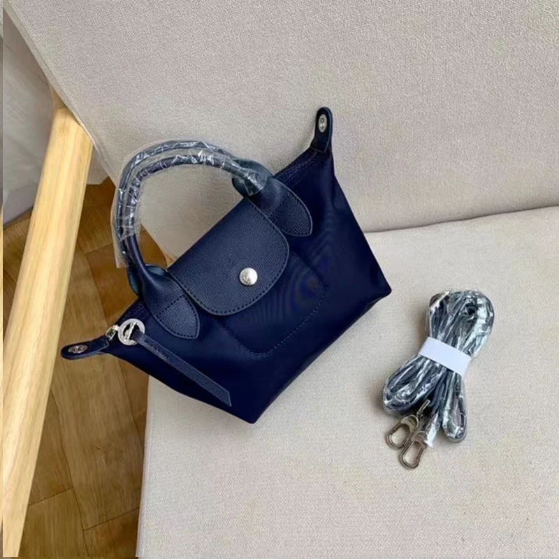 

2021 longxiang dragon designer women's fashion new short handle folding bag handbag one shoulder dumpling bag