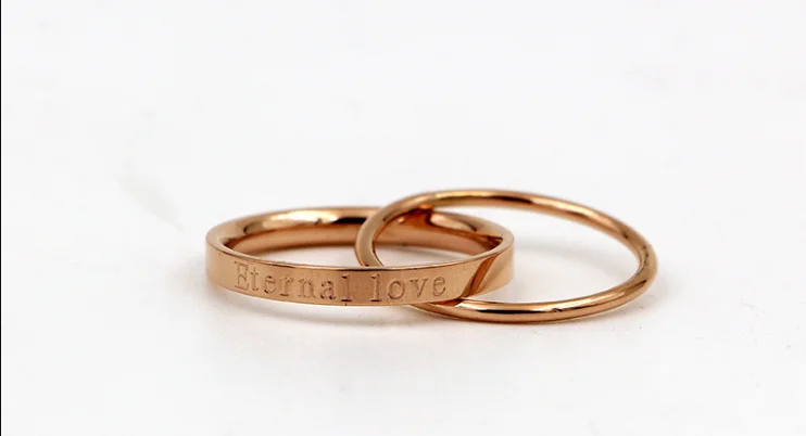 Женское кольцо с двойной петлей из титановой стали цвета розового золота |