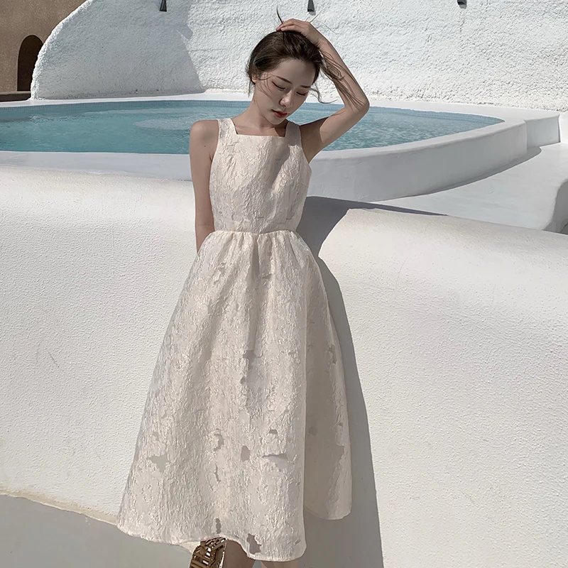 

Backless skirt with shoulder-straps female temperament of the new summer dark grain super fairy fairy beach dress skirt of bitte