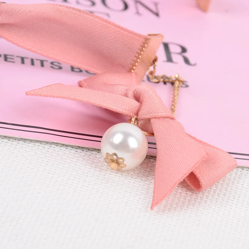 Женская повязка на голову с бантом и жемчугом | Украшения аксессуары