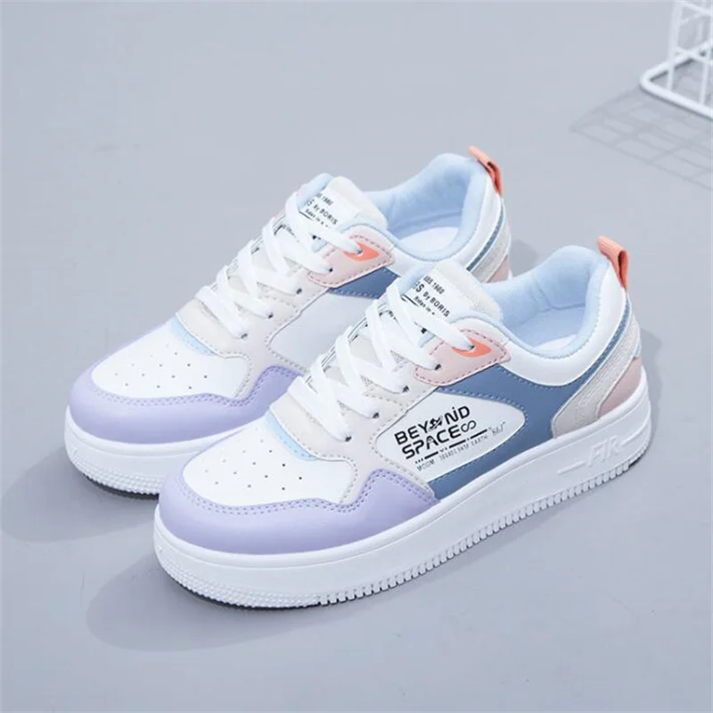 Женские кроссовки из ПУ кожи розовые на плоской вулканизированной подошве