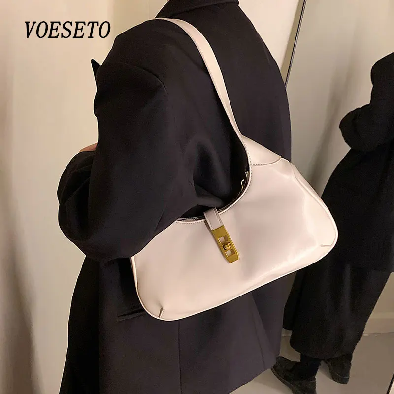 Female Shoulder Messenger Underarm Bag Women's 2022 New Metal Buckle Soft Leather Bag Triangle Handbag Simple dumpling White Bag