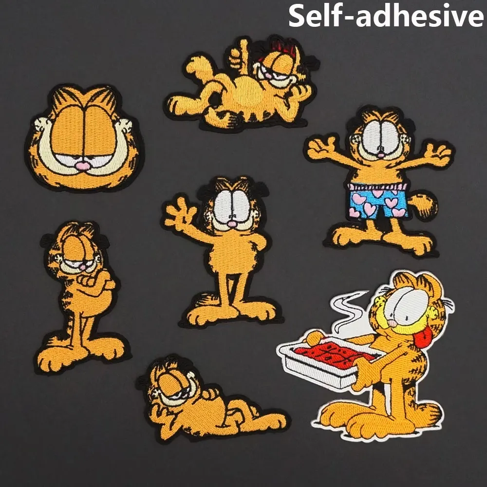 Мультяшная нашивка с большим лицом толстым котом вышитая утюгом на задней