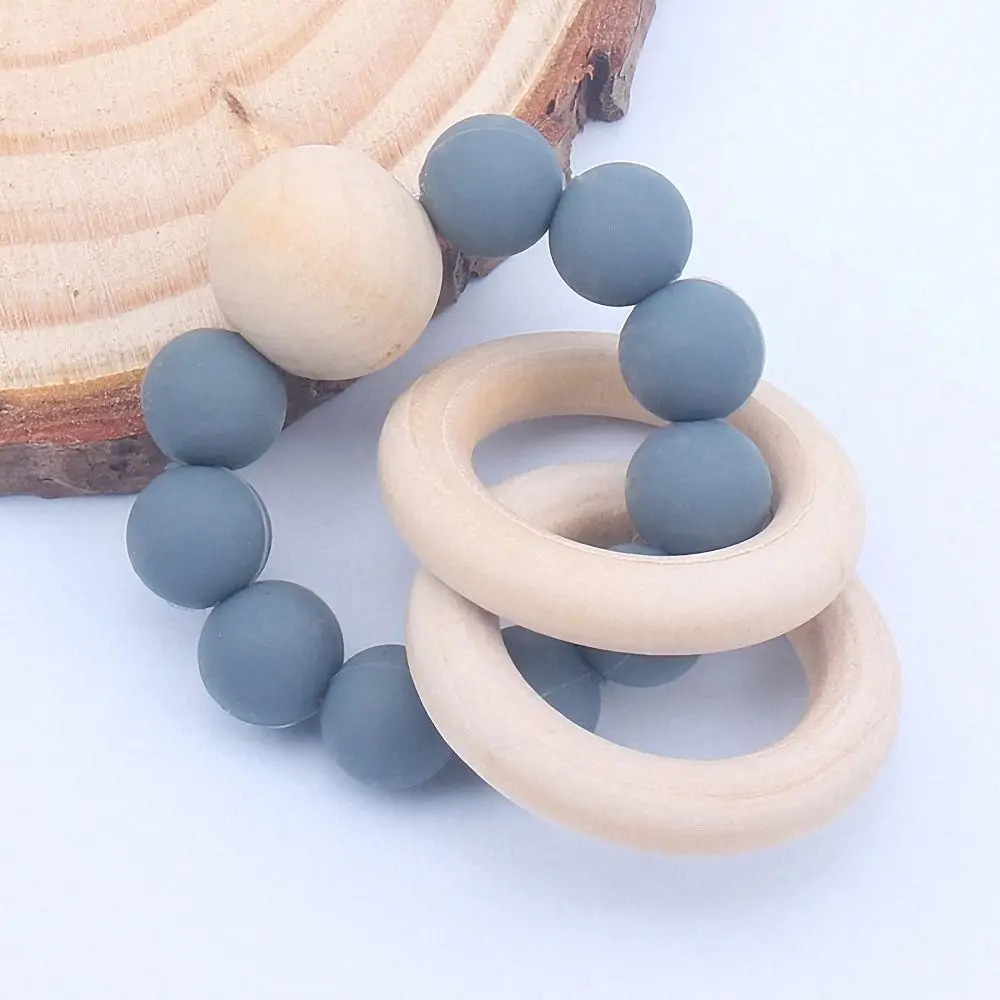 

Baby Teethers Nursing Bracelets Silicone Beads Wooden Rings Rattle Toy Infant Toddler Pacifier Chew Teething Toy Baby Care Toys