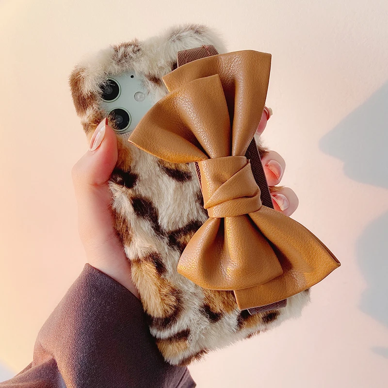 

Leather Bowknot Wrist Strap Leopard Fluffy Plush Phone Case For iPhone 13 Pro Max 12 11 X XR XS Max 8 Plus Warm Fuzzy Fur Cover