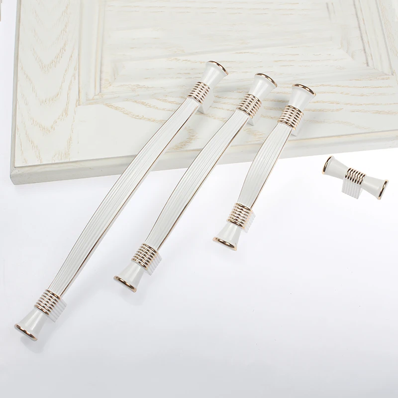 Ручки и ручки для шкафов в современном европейском стиле цвета слоновой кости