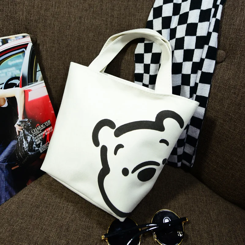 

new Disney mouse fashion trend handbags casual Simple packet fashion bag lunch box bag portable canvas bag handcuffs bag