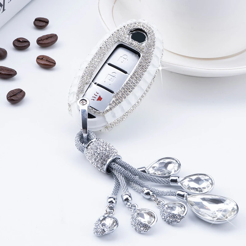 

Роскошный Бриллиантовый чехол ключа дистанционного управления автомобилем чехол в виде ракушки для Nissan Qashqai J10 J11 X-Trail t31t32 ногами Tiida Pathfinder ...